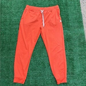 Vuori Women’s Orange Jogger Pants, size medium